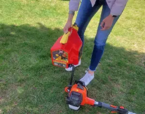 The SureCan 2 Gallon Fuel Can with all its features including the rotating spout, thumb trigger, and durable design."