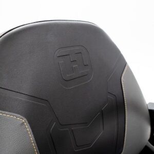 Hustler Raptor XDX 54 fabricated deck – close-up of 54 inch cutting system and anti-scalp wheel